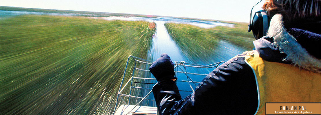Gliding on an airboat through Shingle Creek requires headphones to block out thee roar of the propellers | RanjanPal.com